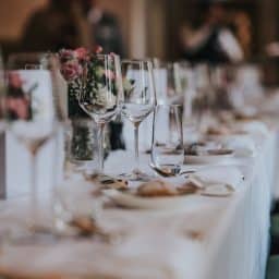 Wedding dinner table with empty glasses